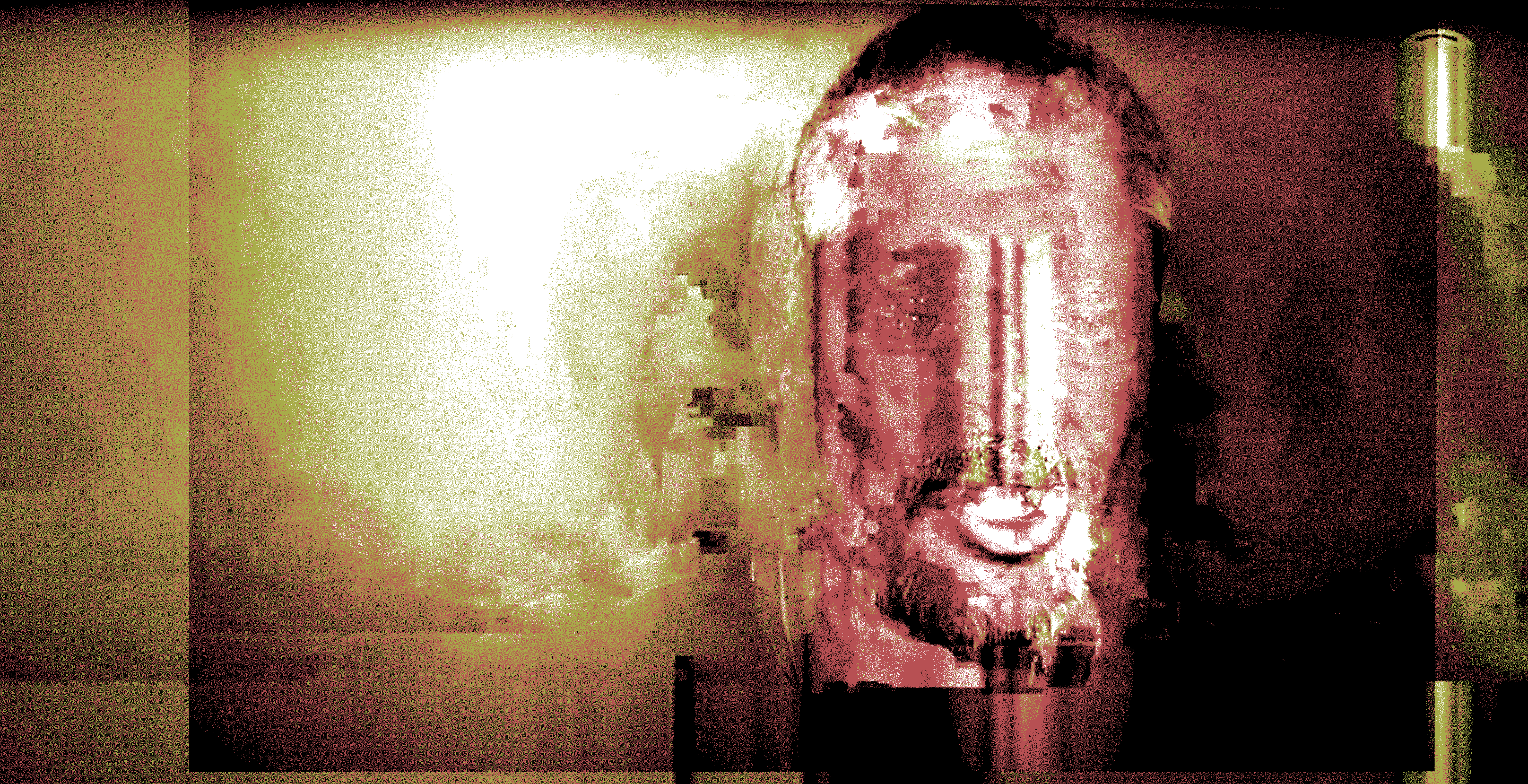 artifact glitched face of the late Dr. Rashid Buttar